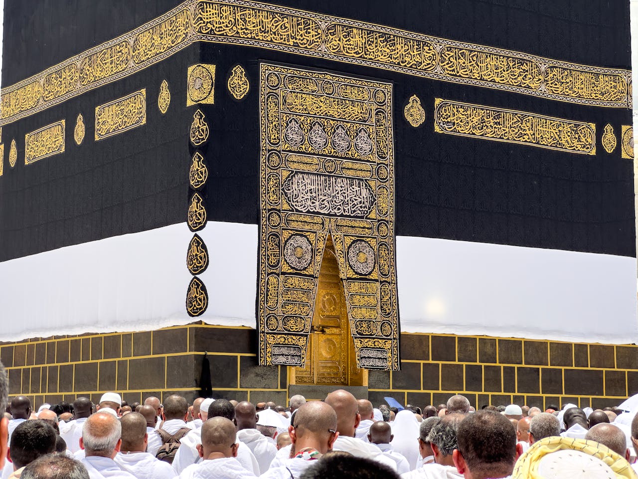 A gathering of pilgrims around the sacred Kaaba in Mecca, a significant Islamic site.